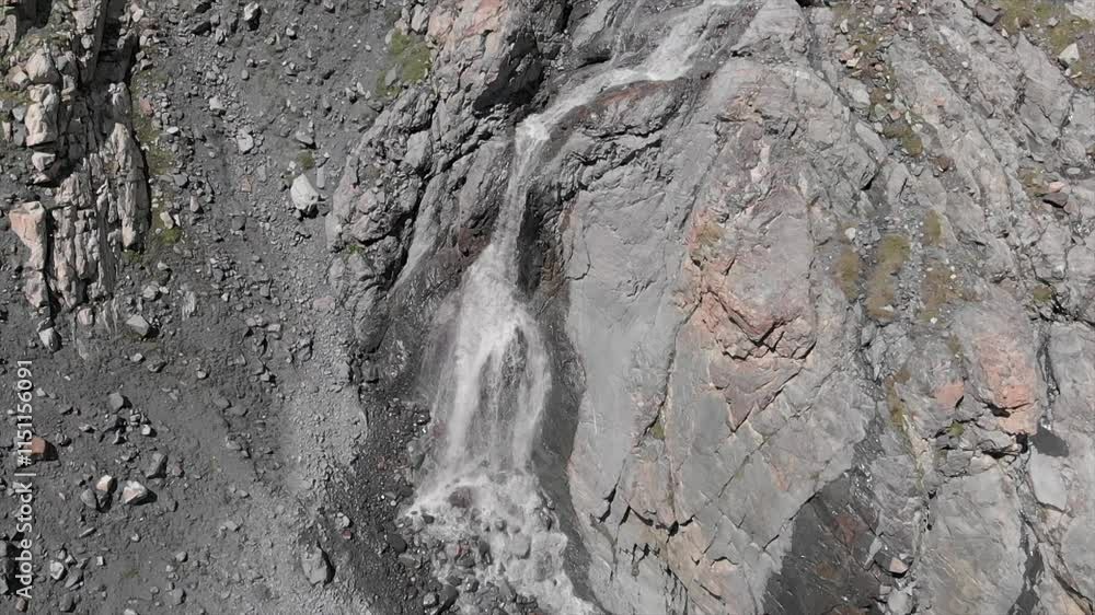 Caucasus, North Ossetia. Genaldon Gorge. Fast stream on rocks. Caucasus, North Ossetia. Genaldon Gorge. Fast stream on rocks.