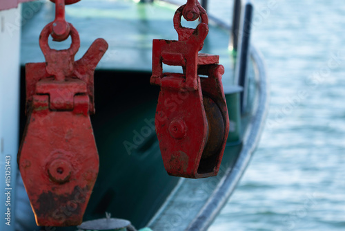 One hanging rope reel on a fishing boat.