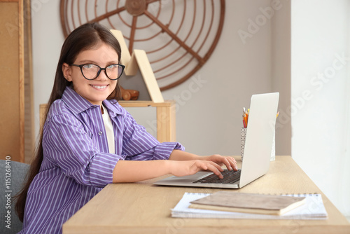 Teenage girl in eyeglasses ...