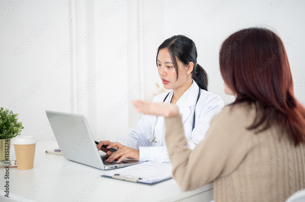 A doctor talking with a patient in the examination room, listening to the patient's symptoms. A doctor talking with a patient in the examination room, listening to the patient's symptoms.