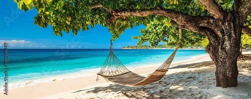 Caribbean beach in Jamaica with hammocks and vibrant blue water