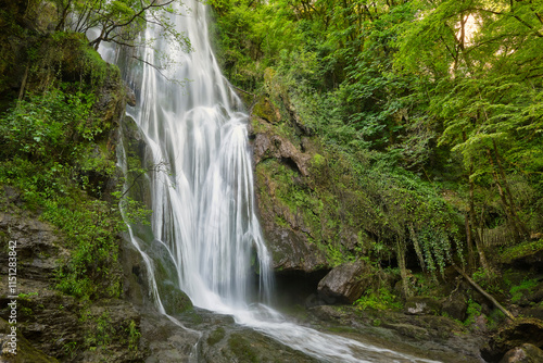 The Cascade d'Autoire waterfall in summer. A 30 meter high waterfall near Autoire in Lot Occitanie Southern France