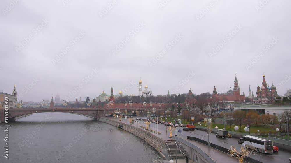 Famous Moscow Cityscape on a cloudy day with the Moskva River and the Kremlin fortress, a historic symbol of Russia Famous Moscow Cityscape on a cloudy day with the Moskva River and the Kremlin fortress, a historic symbol of Russia