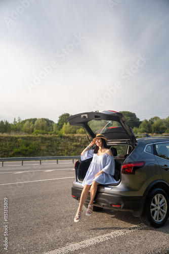 Obraz na płótnie Woman Enjoying a Sunny Day by Her Car w salonie
