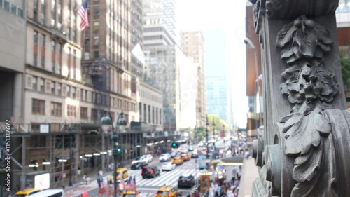 New York City Grand Central Terminal railway station, 42 street. Manhattan Midtown. Yellow taxi cab row, car transport and Pershing Square bridge, NYC, USA. American road traffic, people pedestrians.