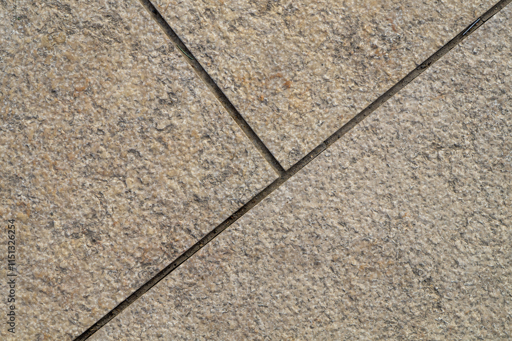 Fototapeta premium Gray paving slabs as texture