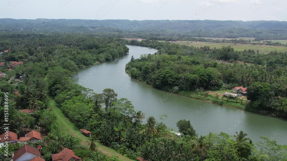 Aerial Cilacap Villages, traditional villages with rice field and river around the villages Cilacap Indonesia Aerial Cilacap Villages, traditional villages with rice field and river around the villages Cilacap Indonesia