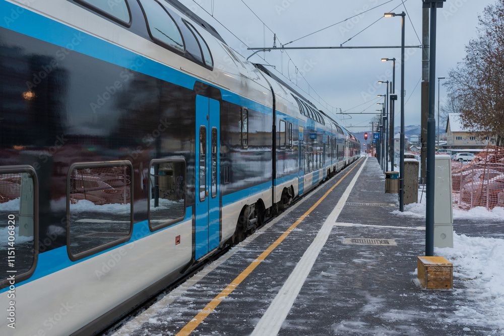 New platform on ljubljana train station. visible modern doubledecker train standing on the platform in direction Zidani Most. Morning view