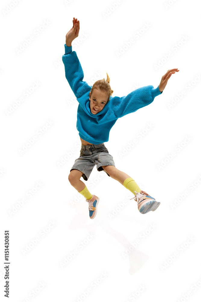 Happy, charming girl dressed colorful old-school clothes jumping with joyful facial expression against white studio background. Concept of business, occupation, human emotions, childhood. Happy, charming girl dressed colorful old-school clothes jumping with joyful facial expression against white studio background. Concept of business, occupation, human emotions, childhood.