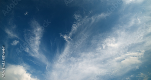 Dramatic sky with white clouds.