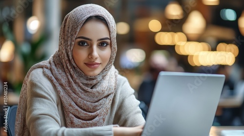 Focused Professional Woman in Hijab Working photo