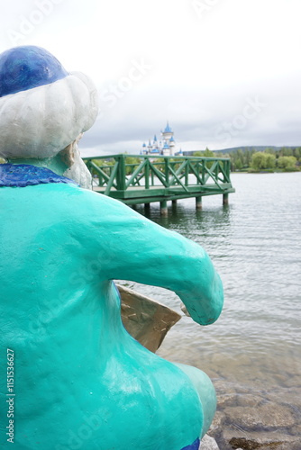 statue of nasreddin near lake photo