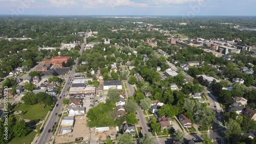 Aerial view of suburban neighborhood in Ypsilanti, Michigan, USA with streets, trees, and residential homes photo