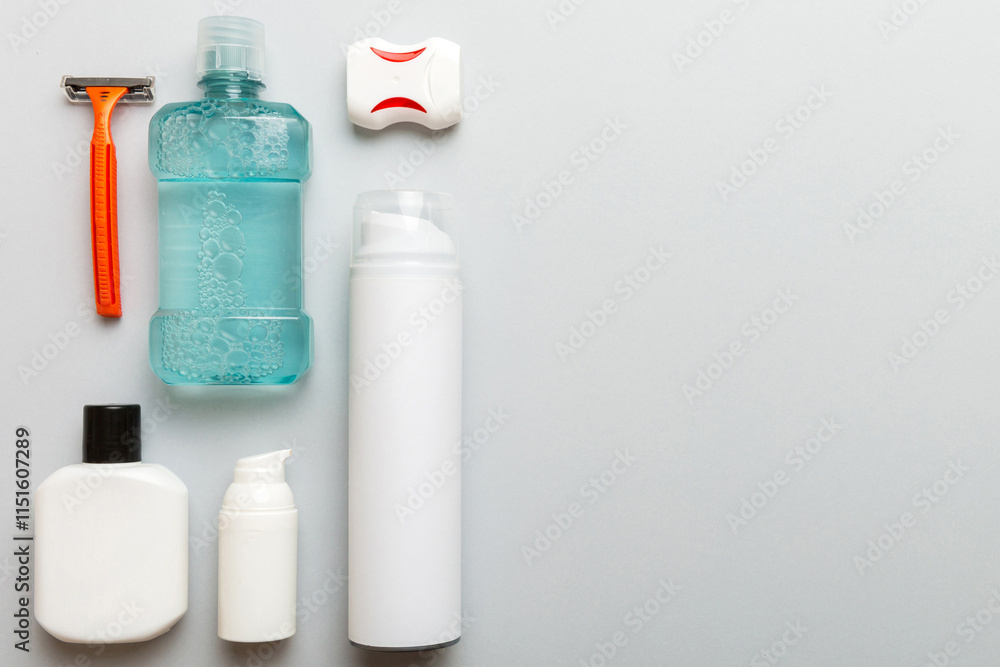 Composition with bath cosmetics on table. razor, toothpaste, soap, gel, toothbrush, mouthwash and other various accessories. Cosmetics for skin health. Bath Mockup for your logo