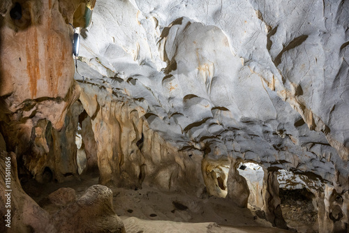 Interior of the large hall of old Karain cave, hidden in Mediterranean region. Confirms human habitation since the early Paleolithic age between 150,000 and 200,000 years ago.Yagca, Antalya, Turkey. photo