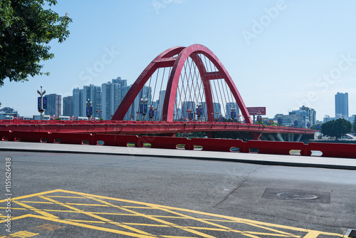 Landmark building of Rainbow Bridge in downtown Deyang City, Sichuan Province, China photo