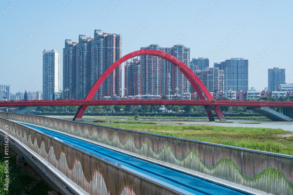 Obraz premium Landmark building of Rainbow Bridge in downtown Deyang City, Sichuan Province, China