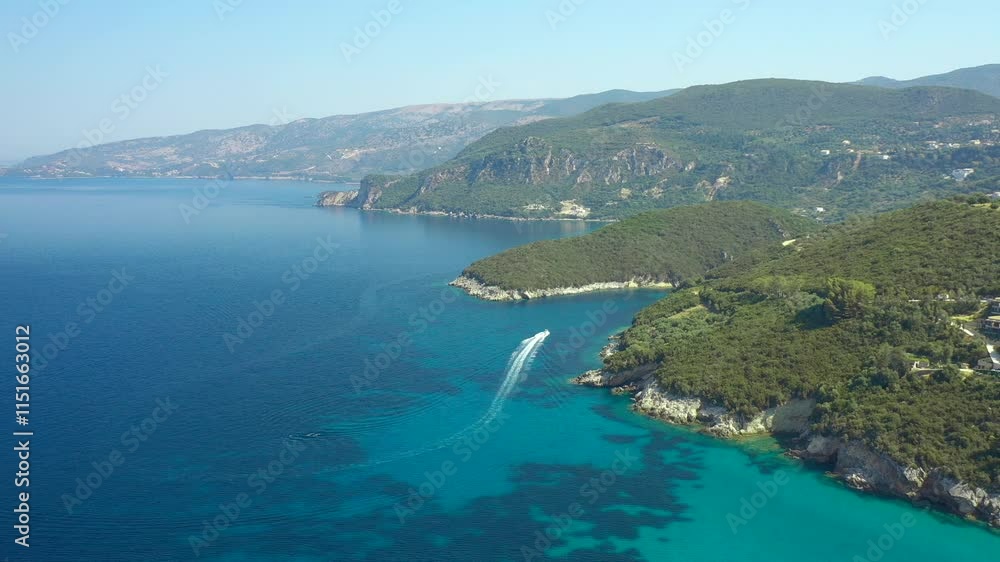 Boat in Serene coastline with crystal-clear waters near Parga, Greece Boat in Serene coastline with crystal-clear waters near Parga, Greece