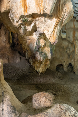 Interior of the large hall of old Karain cave, hidden in Mediterranean region. Confirms human habitation since the early Paleolithic age between 150,000 and 200,000 years ago.Yagca, Antalya, Turkey. photo