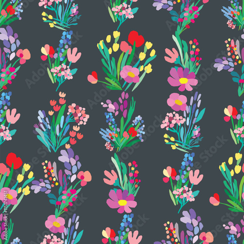 Seamless pattern of colorful flowers and leaves on a dark background. Floral textile print design. Vector wildflowers