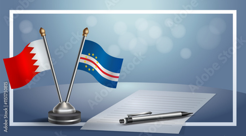 Bahrain and Cape Verde National flags on small table with bokeh background, cooperative relationship