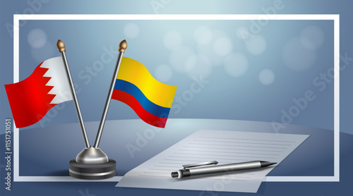 Bahrain and Colombia National flags on small table with bokeh background, cooperative relationship