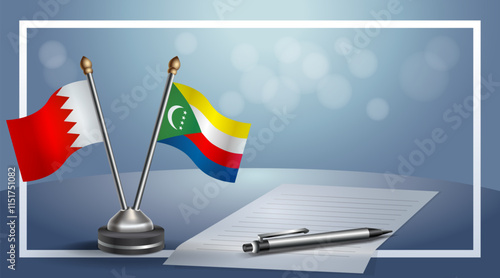 Bahrain and Comoros National flags on small table with bokeh background, cooperative relationship