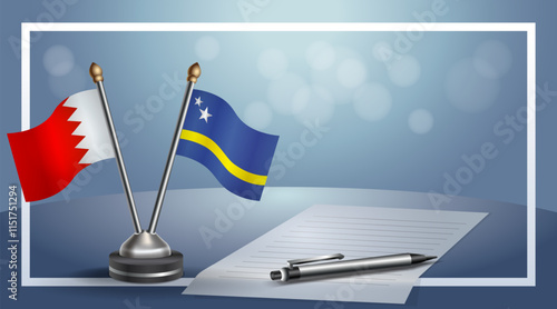 Bahrain and Curacao National flags on small table with bokeh background, cooperative relationship