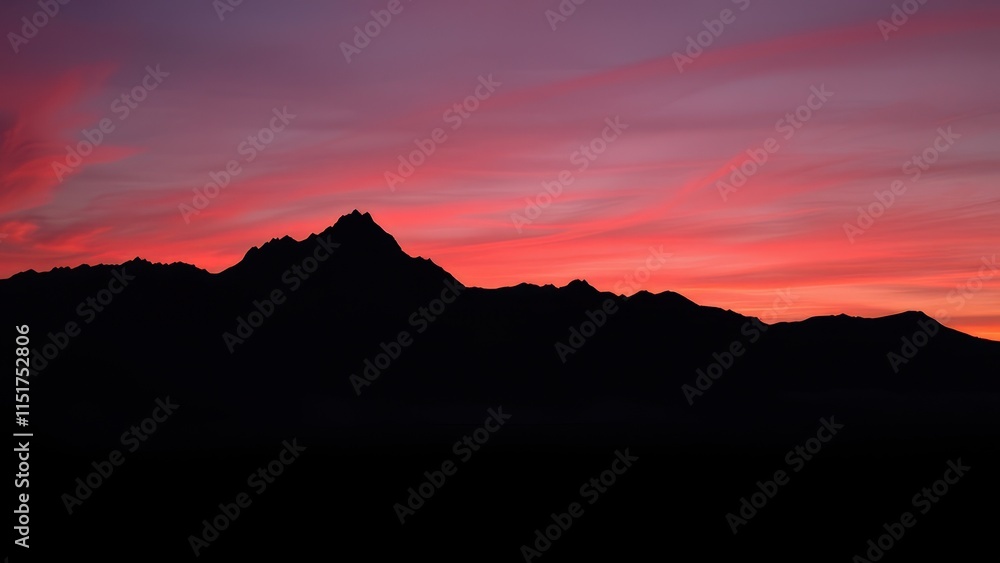 Majestic mountain range outlined in breathtaking silhouette, peaks, rocky, majestic, mountains Majestic mountain range outlined in breathtaking silhouette, peaks, rocky, majestic, mountains