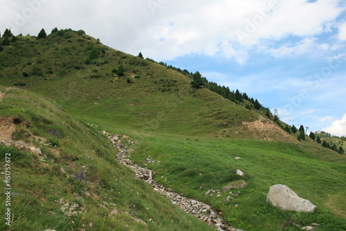Dirt road through a mountain