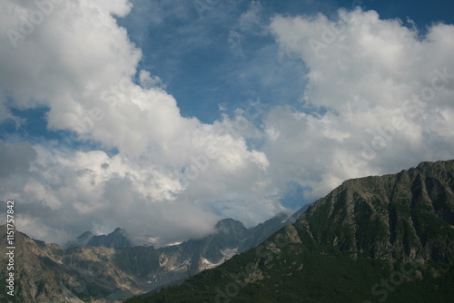The top of a mountain with clouds