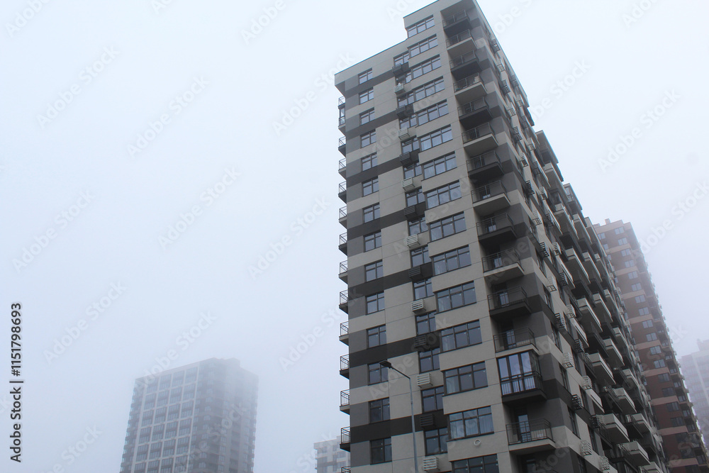 fog over new buildings in the city of Kyiv, Ukraine, modern apartment building in the city fog over new buildings in the city of Kyiv, Ukraine, modern apartment building in the city