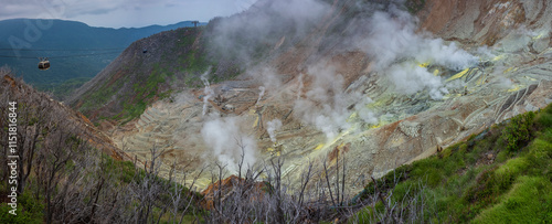 Owakudani volcanic valley in Hakone, Japan is open to visitors and accessible by road or cable car.