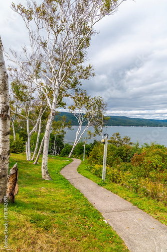 A view down a path towards Ingonish beach on the Cabot Trail Nova Scotia, Canada in the fall photo