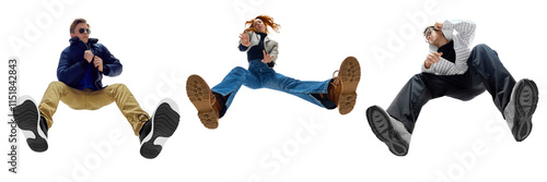 Three trendy young people in stylish casual clothes posing in dynamic pose posing against white background. Bottom view. Concept of fashion, youth culture, lifestyle, casual wear. Banner. Collage