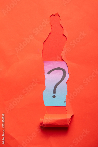Torn paper with a question mark.