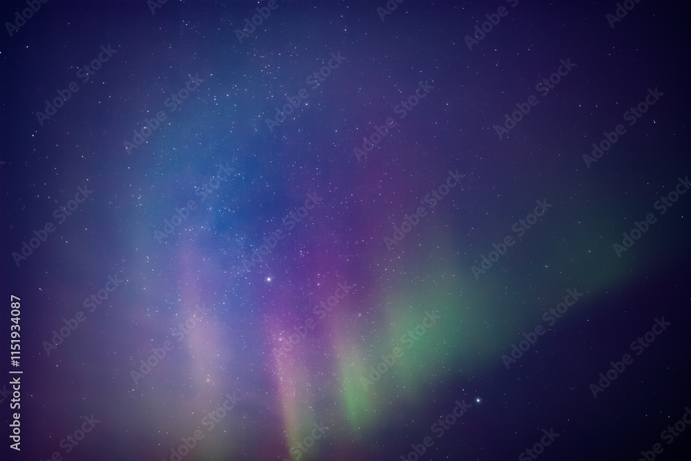 Aurora borealis, polar lights with Milky Way stars.