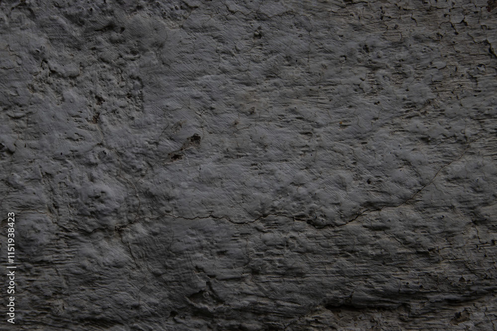Rough Gray Concrete Wall Showing Texture and Natural Cracks Rough Gray Concrete Wall Showing Texture and Natural Cracks