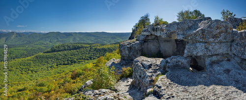 Russia, Republic of Crimea. View of the dilapidated mountains from the top of the dilapidated stone fortress of the famous city of Mangup-Kale of the 5th century in the Bakhchisarai region. photo