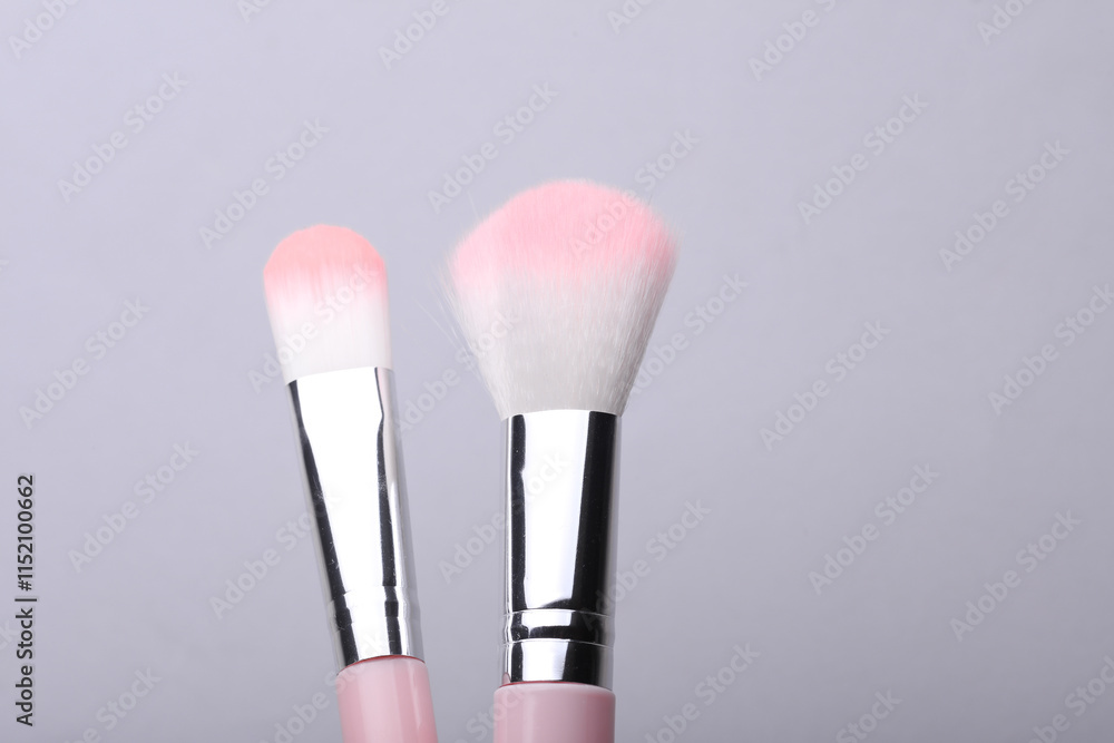 Many makeup sponges on blue background Many makeup sponges on blue background