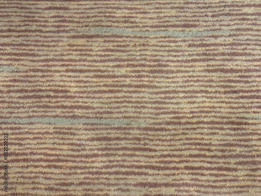 Fototapeta premium Close up of horizontal stripes line carpet rug pattern. Brown and beige horizontal strips and linear line pattern seamless background texture. 