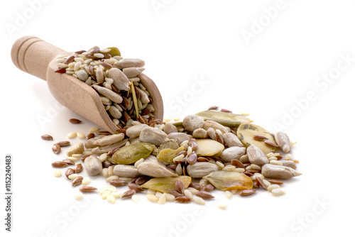 A mixture of seeds and grains for a healthy diet. pumpkin, sunflower and flaxseed seeds, highlighted in white.