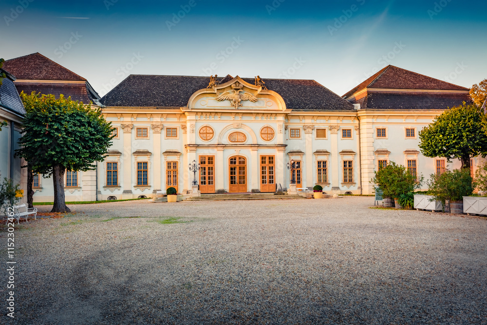 Exciting autumn view of Halbturn palace. Spectacular morning cityscape of Halbturn town in the district of Neusiedl am See in the Austrian state of Burgenland, Europe. Traveling concept background. Exciting autumn view of Halbturn palace. Spectacular morning cityscape of Halbturn town in the district of Neusiedl am See in the Austrian state of Burgenland, Europe. Traveling concept background.