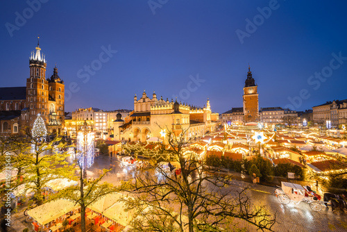 Obraz na płótnie View of the Krakow Christmas Market 2024 and the historic Old Town Square, beautifully illuminated with festive lights and vibrant holiday atmosphere. w salonie