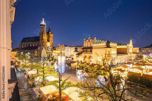 Obraz na płótnie View of the Krakow Christmas Market 2024 and the historic Old Town Square, beautifully illuminated with festive lights and vibrant holiday atmosphere. w salonie