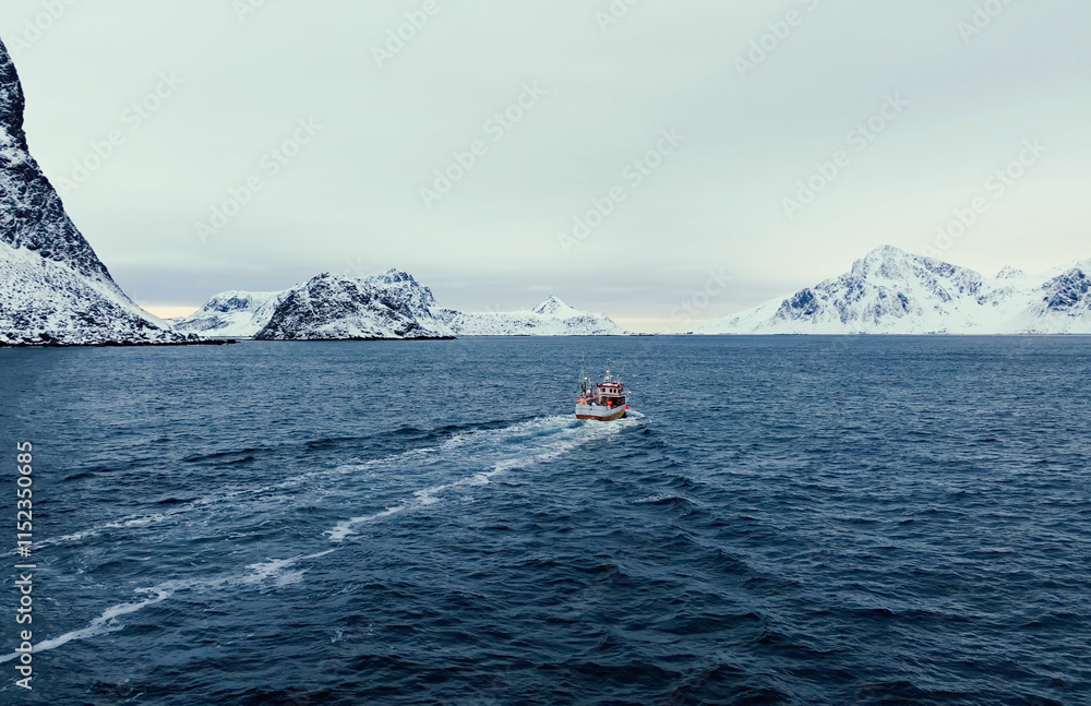 Naklejka premium Embark on a Scenic Winter Boat Journey Through Icy Waters Cresting Majestic Mountains