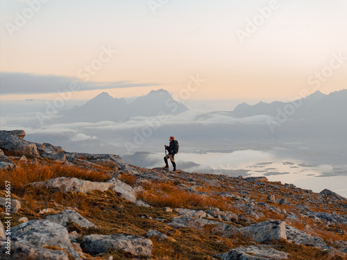 Embark on a stunning mountain hike at sunrise, taking in breathtaking scenic views all around