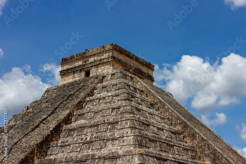 El Castillo, also known as the Temple of Kukulcan is a Mesoamerican step-pyramid that dominates the center of the Chichen Itza archaeological site in the Mexican state of Yucatán. photo