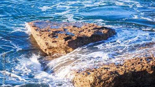 waves crashing on rocks