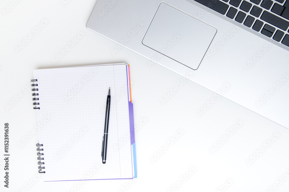 Notebook with pen and laptop on the desk. Education concept. Notebook with pen and laptop on the desk. Education concept.